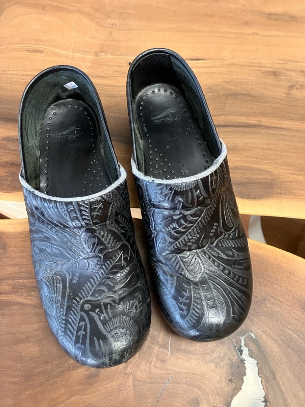 Dansko Black Embossed Leather Slip-On Clogs